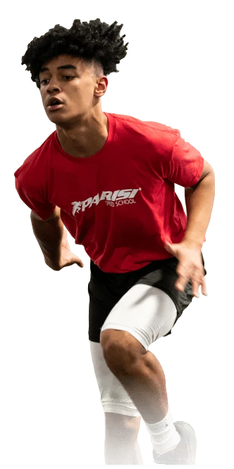 Jeremie Noa in a Parisi Speed School shirt, mid-sprint during a speed drill